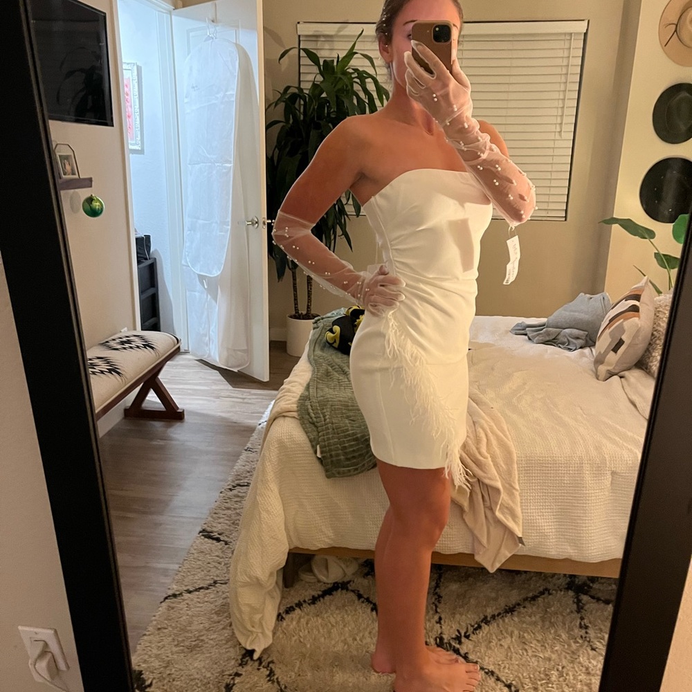 Likely nyc mini bridal dress. Straps included. Size M NWT.